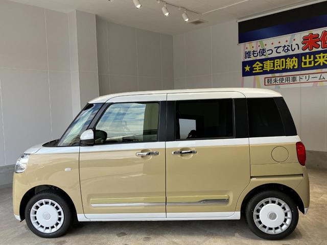 ムーヴキャンバス ストライプスＧ　届出済未使用車　禁煙車　両側電動スライドドア　衝突被害軽減ブレーキ　電子パーキング　オートブレーキホールド　前席シートヒーター　ホットカップホルダー　スマートキー　ＬＥＤヘッドライト　電動格納ミラー（10枚目）