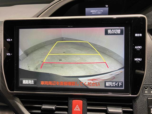 ヴォクシー ＺＳ　煌　純正ナビ　バックカメラ　ＥＴＣ　両側電動スライドドア　Ｂｌｕｅｔｏｏｔｈ　衝突被害軽減ブレーキ　レーンキープアシスト　純正アルミホイール　ステアリングスイッチ　シートバックテーブル　ロールサンシェード（5枚目）