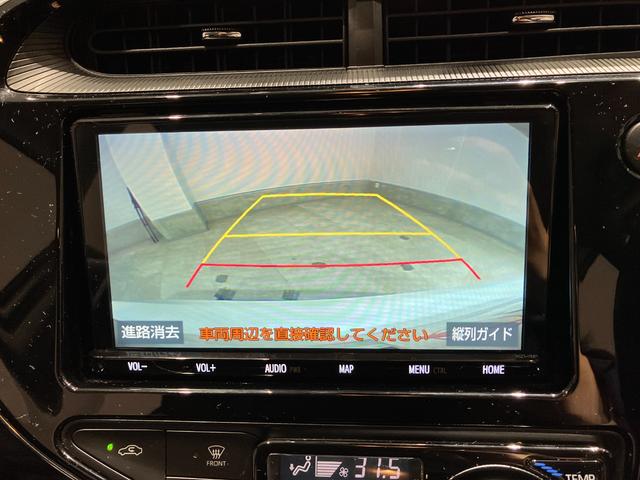 アクア クロスオーバー　純正ナビ　バックカメラ　ＥＴＣ　Ｂｌｕｅｔｏｏｔｈ接続　純正アルミホイール　ルーフレール　衝突被害軽減ブレーキ　レーンキープアシスト　オートハイビーム　シートヒーター　スマートキー　電動格納式ミラー（6枚目）