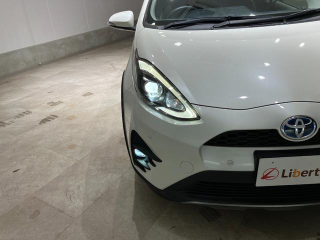 アクア クロスオーバー　純正ナビ　バックカメラ　ＥＴＣ　Ｂｌｕｅｔｏｏｔｈ接続　純正アルミホイール　ルーフレール　衝突被害軽減ブレーキ　レーンキープアシスト　オートハイビーム　シートヒーター　スマートキー　電動格納式ミラー（21枚目）