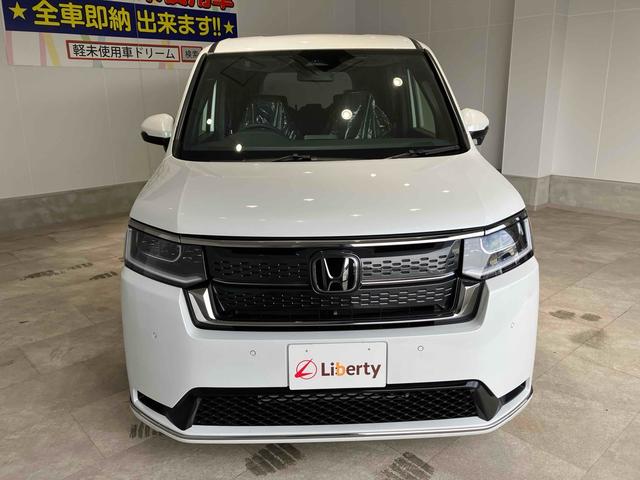 ステップワゴン スパーダ HondaSENSING 両側電動スライドドア 追従型クルーズコントロール 純正アルミホイール 電動リアゲート 電子パーキング オートブレーキホールド シートヒーター 後席エアコン 2列目オットマン(7枚目)