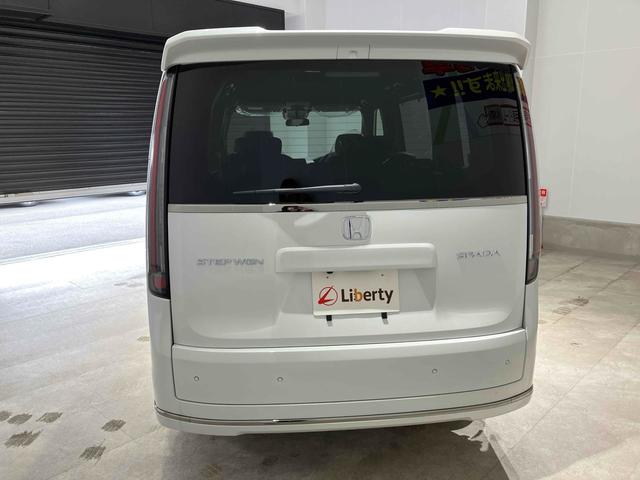 ステップワゴン スパーダ HondaSENSING 両側電動スライドドア 追従型クルーズコントロール 純正アルミホイール 電動リアゲート 電子パーキング オートブレーキホールド シートヒーター 後席エアコン 2列目オットマン(11枚目)