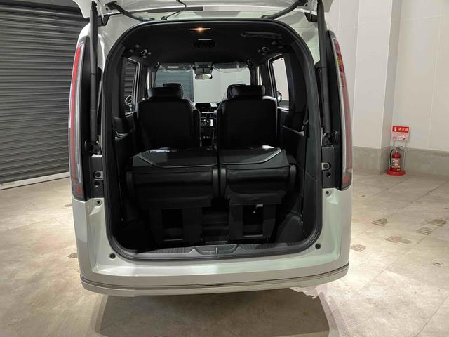 ステップワゴン スパーダ HondaSENSING 両側電動スライドドア 追従型クルーズコントロール 純正アルミホイール 電動リアゲート 電子パーキング オートブレーキホールド シートヒーター 後席エアコン 2列目オットマン(15枚目)