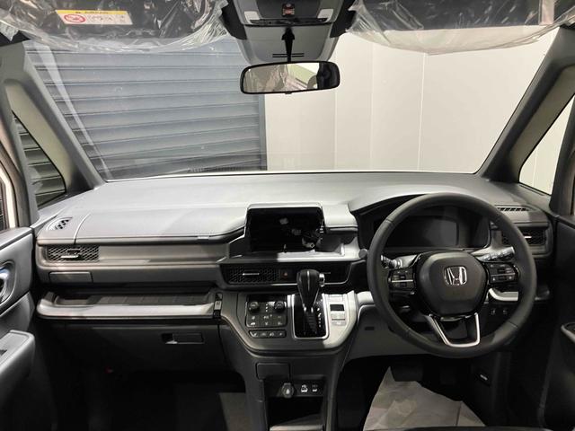 ステップワゴン スパーダ HondaSENSING 両側電動スライドドア 追従型クルーズコントロール 純正アルミホイール 電動リアゲート 電子パーキング オートブレーキホールド シートヒーター 後席エアコン 2列目オットマン(33枚目)