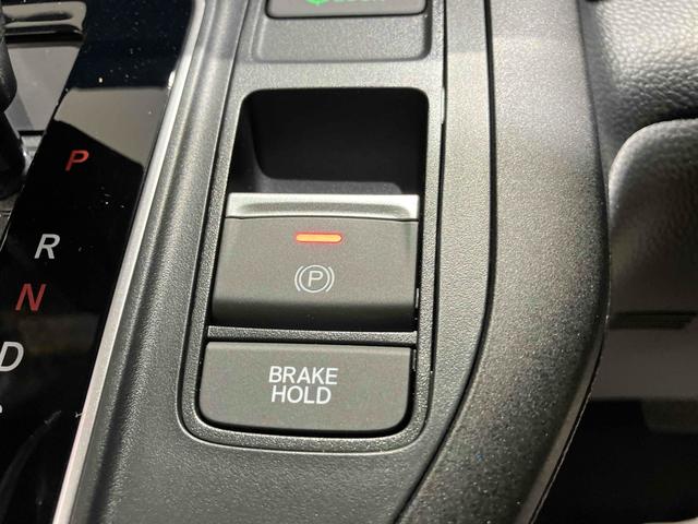 ステップワゴン スパーダ HondaSENSING 両側電動スライドドア 追従型クルーズコントロール 純正アルミホイール 電動リアゲート 電子パーキング オートブレーキホールド シートヒーター 後席エアコン 2列目オットマン(45枚目)