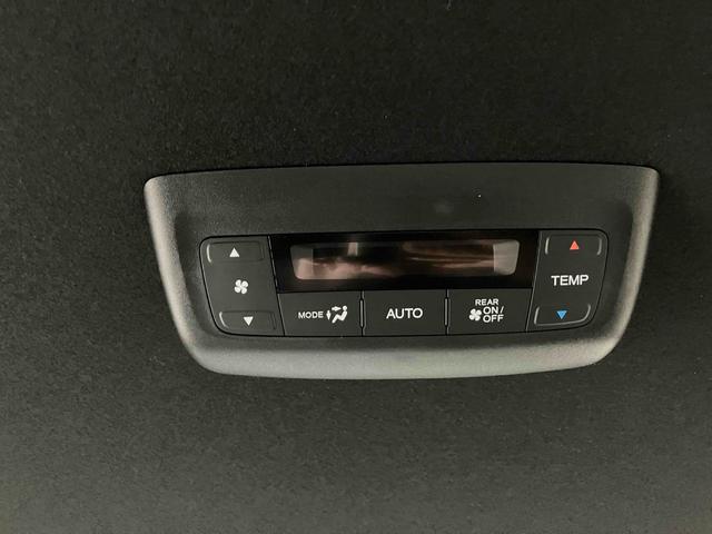 ステップワゴン スパーダ HondaSENSING 両側電動スライドドア 追従型クルーズコントロール 純正アルミホイール 電動リアゲート 電子パーキング オートブレーキホールド シートヒーター 後席エアコン 2列目オットマン(48枚目)