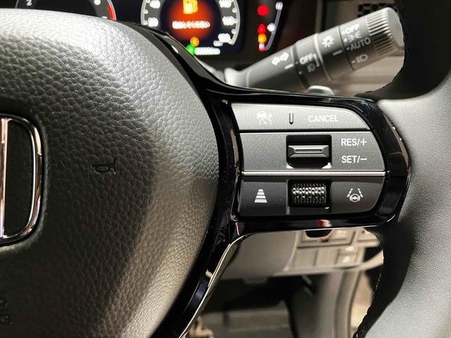 ステップワゴン スパーダ　ＨｏｎｄａＳＥＮＳＩＮＧ　両側電動スライドドア　電動リアゲート　アダプティブクルーズ　純正アルミホイール　オートライト　スマートキー　電動格納ミラー　シートヒーター　３列シート（37枚目）