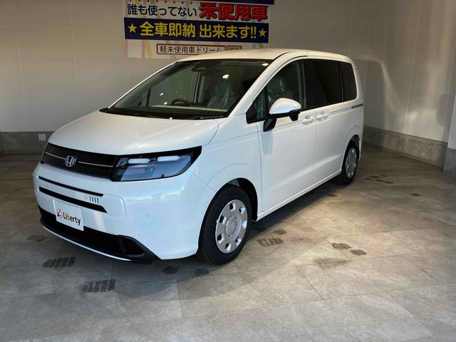 フリード ｅ：ＨＥＶエアー　クリアランスソナー　オートクルーズコントロール　衝突被害軽減システム　両側電動スライドドア　オートライト　ＬＥＤヘッドランプ　スマートキー　電動格納ミラー　３列シート　ウォークスルー（6枚目）