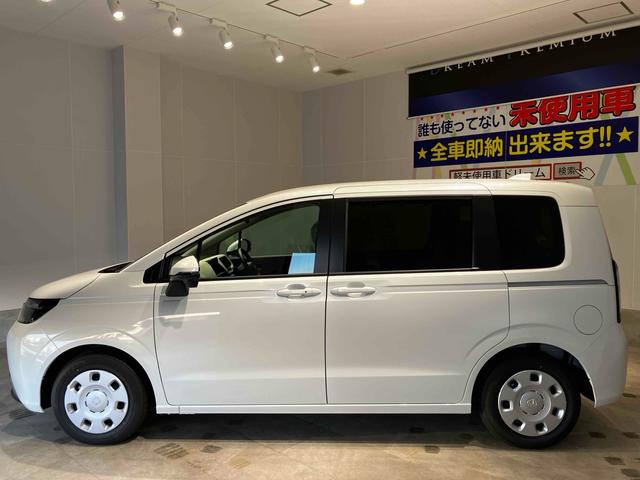 フリード ｅ：ＨＥＶエアー　クリアランスソナー　オートクルーズコントロール　衝突被害軽減システム　両側電動スライドドア　オートライト　ＬＥＤヘッドランプ　スマートキー　電動格納ミラー　３列シート　ウォークスルー（9枚目）