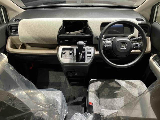 フリード ｅ：ＨＥＶエアー　クリアランスソナー　オートクルーズコントロール　衝突被害軽減システム　両側電動スライドドア　オートライト　ＬＥＤヘッドランプ　スマートキー　電動格納ミラー　３列シート　ウォークスルー（34枚目）