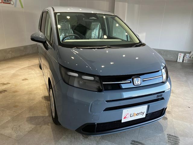 フリード ｅ：ＨＥＶエアー　届出済未使用車　クリアランスソナー　オートクルーズコントロール　レーンアシスト　衝突被害軽減システム　両側電動スライドドア　オートライト　ＬＥＤヘッドランプ　スマートキー　アイドリングストップ（8枚目）