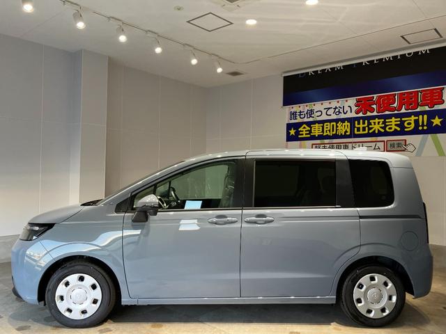 フリード ｅ：ＨＥＶエアー　届出済未使用車　クリアランスソナー　オートクルーズコントロール　レーンアシスト　衝突被害軽減システム　両側電動スライドドア　オートライト　ＬＥＤヘッドランプ　スマートキー　アイドリングストップ（10枚目）