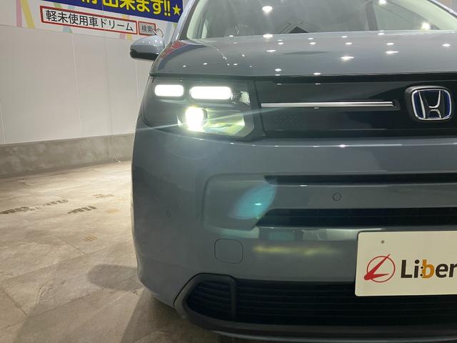 フリード ｅ：ＨＥＶエアー　届出済未使用車　クリアランスソナー　オートクルーズコントロール　レーンアシスト　衝突被害軽減システム　両側電動スライドドア　オートライト　ＬＥＤヘッドランプ　スマートキー　アイドリングストップ（17枚目）