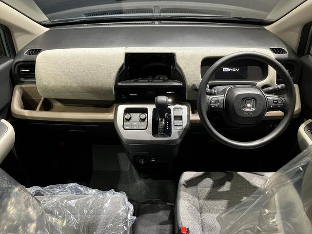 フリード ｅ：ＨＥＶエアー　届出済未使用車　クリアランスソナー　オートクルーズコントロール　レーンアシスト　衝突被害軽減システム　両側電動スライドドア　オートライト　ＬＥＤヘッドランプ　スマートキー　アイドリングストップ（27枚目）