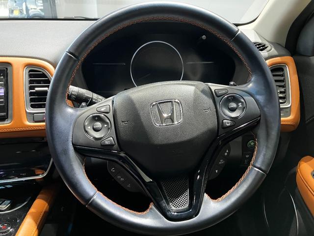 ヴェゼル ハイブリッドZ・ホンダセンシング 衝突軽減B 純正ナビ Bカメラ ビルドインETC アダプティブクルーズコントロール LEDヘッドライト フォグライト スマートキー プッシュスタート 革巻きハンドル 前席シートヒーター 電子パーキング(6枚目)