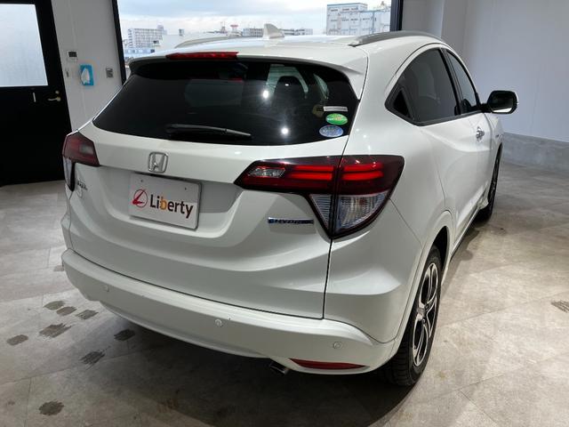 ヴェゼル ハイブリッドZ・ホンダセンシング 衝突軽減B 純正ナビ Bカメラ ビルドインETC アダプティブクルーズコントロール LEDヘッドライト フォグライト スマートキー プッシュスタート 革巻きハンドル 前席シートヒーター 電子パーキング(18枚目)