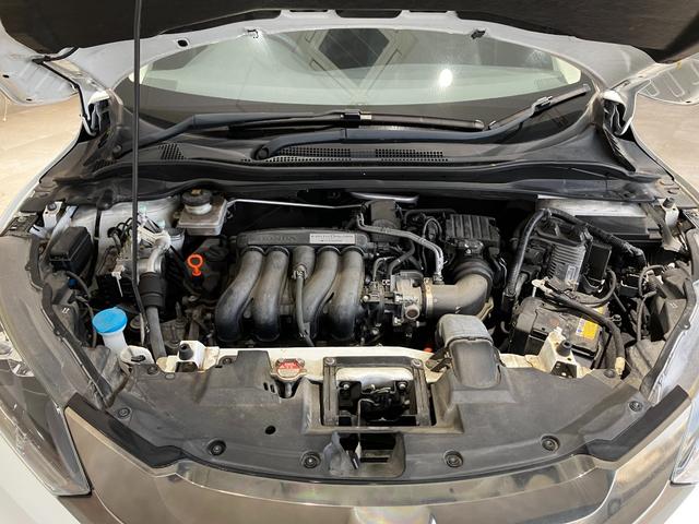 ヴェゼル ハイブリッドZ・ホンダセンシング 衝突軽減B 純正ナビ Bカメラ ビルドインETC アダプティブクルーズコントロール LEDヘッドライト フォグライト スマートキー プッシュスタート 革巻きハンドル 前席シートヒーター 電子パーキング(23枚目)