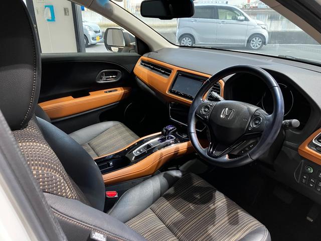 ヴェゼル ハイブリッドZ・ホンダセンシング 衝突軽減B 純正ナビ Bカメラ ビルドインETC アダプティブクルーズコントロール LEDヘッドライト フォグライト スマートキー プッシュスタート 革巻きハンドル 前席シートヒーター 電子パーキング(29枚目)