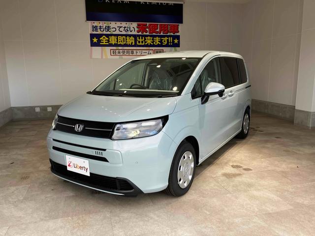 フリード エアー　登録済未使用車　禁煙車　クリアランスソナー　クルーズコントロール　レーンアシスト　衝突被害軽減システム　両側電動スライドドア　オートライト　ＬＥＤヘッドランプ　スマートキー　電動格納ミラー（6枚目）