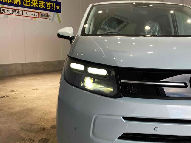 フリード エアー　登録済未使用車　禁煙車　クリアランスソナー　クルーズコントロール　レーンアシスト　衝突被害軽減システム　両側電動スライドドア　オートライト　ＬＥＤヘッドランプ　スマートキー　電動格納ミラー（13枚目）