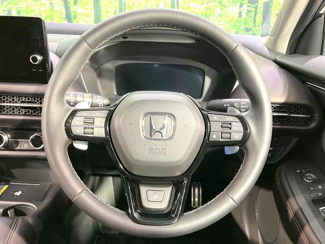 ＺＲ－Ｖ ｅ：ＨＥＶ　Ｚ　純正９型ナビ　ＢＯＳＥサウンド　Ｂｌｕｅｔｏｏｔｈ　ホンダセンシング　全周囲カメラ　アダプティブクルーズ　シートヒータ　パワーバックドア　ブラインドスポット　ＬＥＤヘッドライト　純正１８インチアルミ（24枚目）