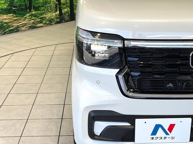 Ｎ－ＢＯＸカスタム ベースグレード　届出済未使用車　両側電動スライドドア　ホンダセンシング　アダプティブクルーズ　前席シートヒーター　コーナーセンサー　オートブレーキホールド　ＬＥＤヘッド　オートハイビーム　純正１４アルミ（12枚目）