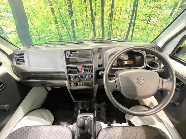 キャリイトラック KCエアコン・パワステ農繁仕様 4WD セーフティサポート エアコン パワステ デフロック プロテクター付3方開荷台 リアゲートチェーン バックブザー スピーカー一体型AM/FMラジオ 手動ウインドウ(2枚目)