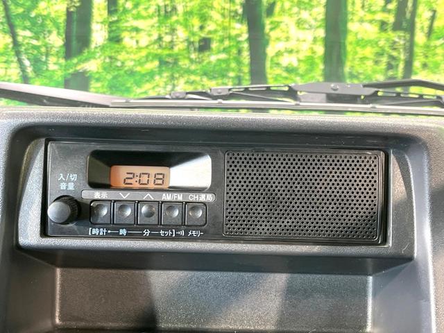 キャリイトラック KCエアコン・パワステ農繁仕様 4WD セーフティサポート エアコン パワステ デフロック プロテクター付3方開荷台 リアゲートチェーン バックブザー スピーカー一体型AM/FMラジオ 手動ウインドウ(7枚目)