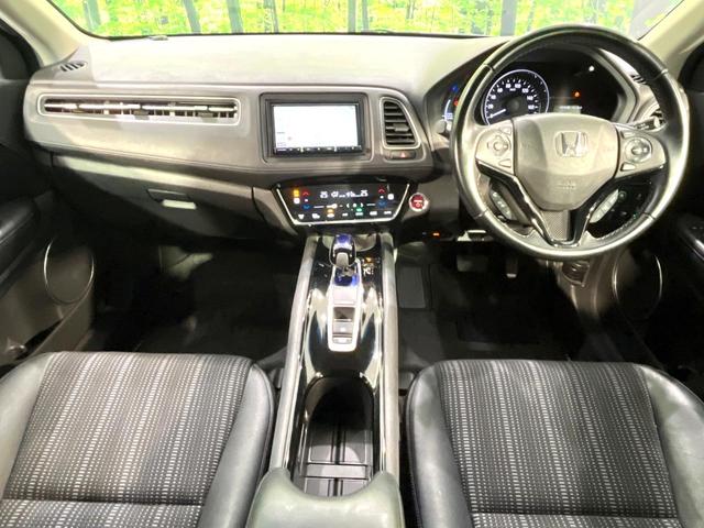ヴェゼル ハイブリッドＺ・ホンダセンシング　ＳＤナビ　バックカメラ　ホンダセンシング　アダプティブクルーズ　Ｂｌｕｅｔｏｏｔｈ　シートヒーター　ＥＴＣ　ドラレコ　電子パーキング　オートデュアルエアコン　スマートキー　チップアップシート（2枚目）