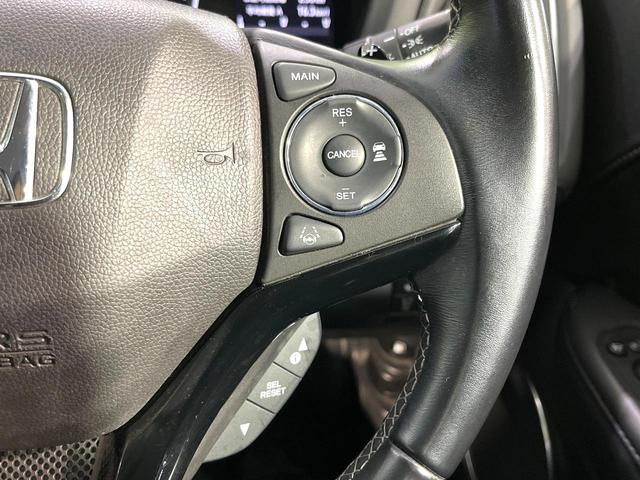ヴェゼル ハイブリッドＺ・ホンダセンシング　ＳＤナビ　バックカメラ　ホンダセンシング　アダプティブクルーズ　Ｂｌｕｅｔｏｏｔｈ　シートヒーター　ＥＴＣ　ドラレコ　電子パーキング　オートデュアルエアコン　スマートキー　チップアップシート（6枚目）