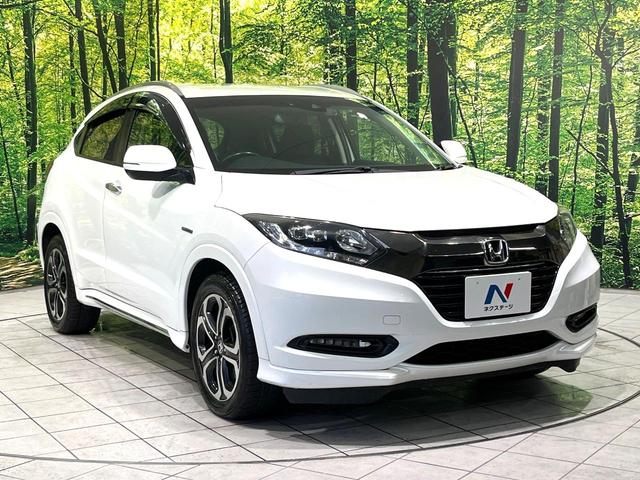 ヴェゼル ハイブリッドＺ・ホンダセンシング　ＳＤナビ　バックカメラ　ホンダセンシング　アダプティブクルーズ　Ｂｌｕｅｔｏｏｔｈ　シートヒーター　ＥＴＣ　ドラレコ　電子パーキング　オートデュアルエアコン　スマートキー　チップアップシート（16枚目）