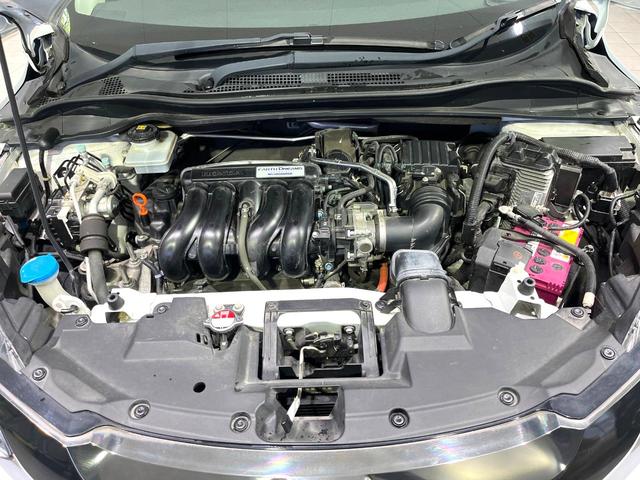 ヴェゼル ハイブリッドＺ・ホンダセンシング　ＳＤナビ　バックカメラ　ホンダセンシング　アダプティブクルーズ　Ｂｌｕｅｔｏｏｔｈ　シートヒーター　ＥＴＣ　ドラレコ　電子パーキング　オートデュアルエアコン　スマートキー　チップアップシート（18枚目）