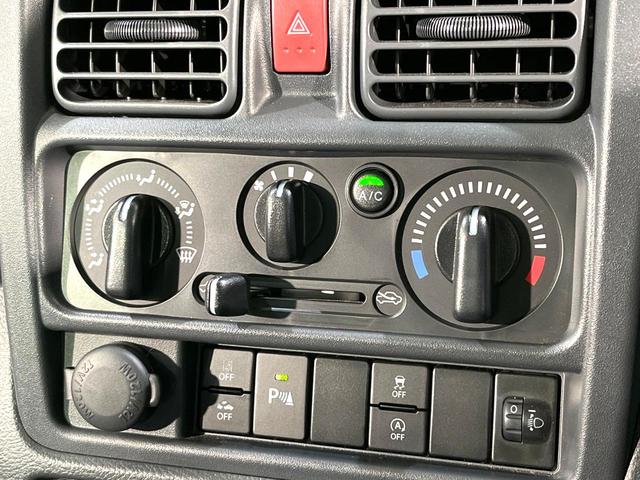 スーパーキャリイ Ｌ　ディスプレイオーディオ　セーフティサポート　パーキングセンサー　Ｂｌｕｅｔｏｏｔｈ　パワーウインドウ　エアコン　パワステ　塩ビシート　オーバーヘッドシェルフ　リモコンキー　３方開荷台（8枚目）