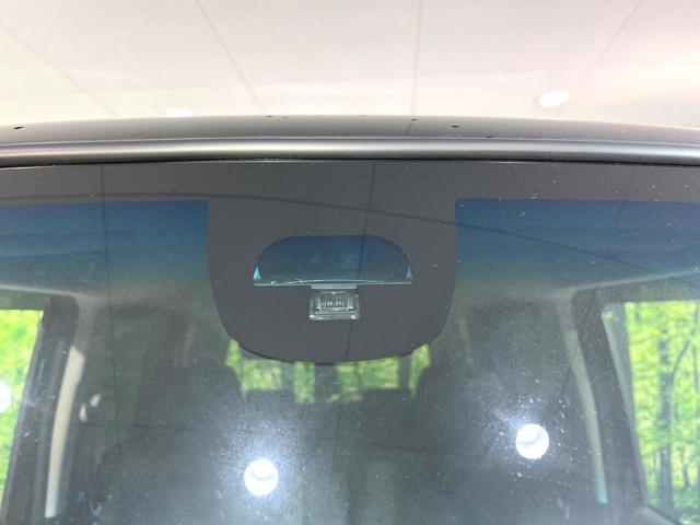 Ｎ－ＢＯＸカスタム Ｇ　ＳＳパッケージ　両側電動ドア　Ｂｌｕｅｔｏｏｔｈ　純正ＳＤナビ　バックカメラ　衝突被害軽減システム　禁煙車　スマートキー　ＨＩＤヘッド　ＥＴＣ　純正１４アルミ　オートライト　オートエアコン　ＣＤ（6枚目）