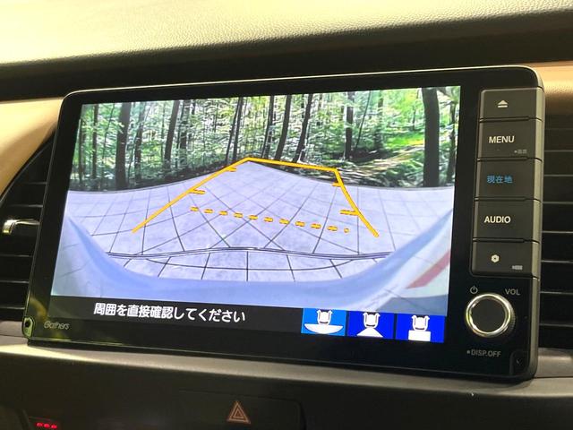 フィット ｅ：ＨＥＶリュクス　純正９型ナビ　バックカメラ　アダプティブクルーズコントロール　シートヒーター　コーナーセンサー　ハーフレザーシート　禁煙　革巻ステアリング　ＬＥＤヘッドライト　Ｂｌｕｅｔｏｏｔｈ　置くだけ充電（25枚目）