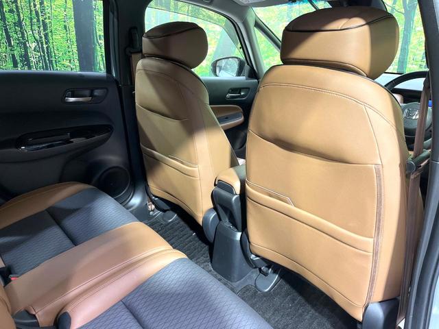 フィット ｅ：ＨＥＶリュクス　純正９型ナビ　バックカメラ　アダプティブクルーズコントロール　シートヒーター　コーナーセンサー　ハーフレザーシート　禁煙　革巻ステアリング　ＬＥＤヘッドライト　Ｂｌｕｅｔｏｏｔｈ　置くだけ充電（49枚目）