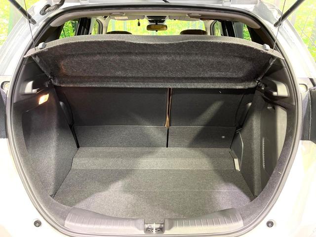 フィット ｅ：ＨＥＶリュクス　純正９型ナビ　バックカメラ　アダプティブクルーズコントロール　シートヒーター　コーナーセンサー　ハーフレザーシート　禁煙　革巻ステアリング　ＬＥＤヘッドライト　Ｂｌｕｅｔｏｏｔｈ　置くだけ充電（52枚目）