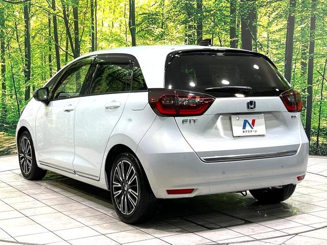 フィット ｅ：ＨＥＶリュクス　純正９型ナビ　バックカメラ　アダプティブクルーズコントロール　シートヒーター　コーナーセンサー　ハーフレザーシート　禁煙　革巻ステアリング　ＬＥＤヘッドライト　Ｂｌｕｅｔｏｏｔｈ　置くだけ充電（56枚目）