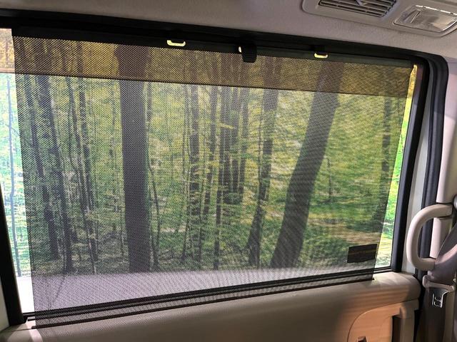 セレナ 20G 純正ナビ バックカメラ 両側電動スライドドア リアオートエアコン クルーズコントロール ミラー一体型ドラレコ 禁煙 HIDヘッドライト 革巻ステアリング アイドリングストップ ロールサンシェード(42枚目)