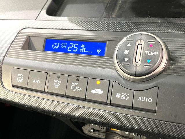 フリード Ｇ　エアロ　純正ナビ　バックカメラ　両側電動スライドドア　ＥＴＣ　Ｂｌｕｅｔｏｏｔｈ　スマートキー　オートエアコン　オートライト　アイドリングストップ　電動格納ミラー　ＨＩＤヘッドライト　純正１５インチアルミ（7枚目）