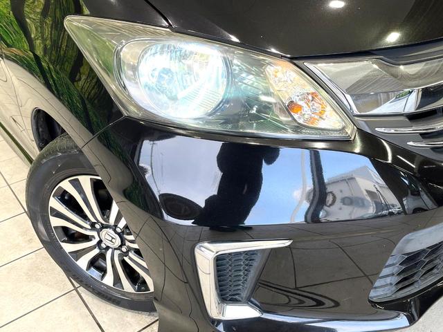 フリード Ｇ　エアロ　純正ナビ　バックカメラ　両側電動スライドドア　ＥＴＣ　Ｂｌｕｅｔｏｏｔｈ　スマートキー　オートエアコン　オートライト　アイドリングストップ　電動格納ミラー　ＨＩＤヘッドライト　純正１５インチアルミ（12枚目）