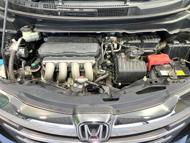 フリード Ｇ　エアロ　純正ナビ　バックカメラ　両側電動スライドドア　ＥＴＣ　Ｂｌｕｅｔｏｏｔｈ　スマートキー　オートエアコン　オートライト　アイドリングストップ　電動格納ミラー　ＨＩＤヘッドライト　純正１５インチアルミ（18枚目）