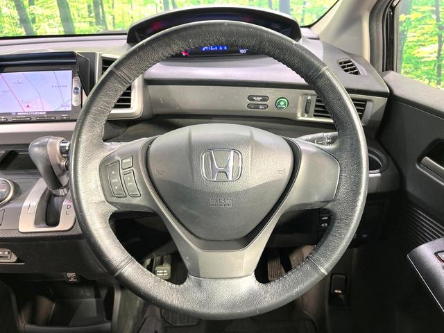 フリード Ｇ　エアロ　純正ナビ　バックカメラ　両側電動スライドドア　ＥＴＣ　Ｂｌｕｅｔｏｏｔｈ　スマートキー　オートエアコン　オートライト　アイドリングストップ　電動格納ミラー　ＨＩＤヘッドライト　純正１５インチアルミ（23枚目）