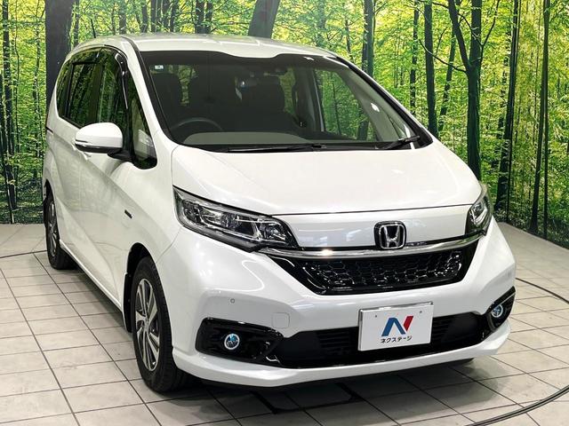 フリードハイブリッド ハイブリッド・Ｇホンダセンシング　純正９型ナビ　バックカメラ　両側電動スライドドア　前席シートヒーター　アダプティブクルーズコントロール　スマートキー　ＬＥＤヘッド＆フォグランプ　ＥＴＣ　ドライブレコーダー　アイドリングストップ（17枚目）