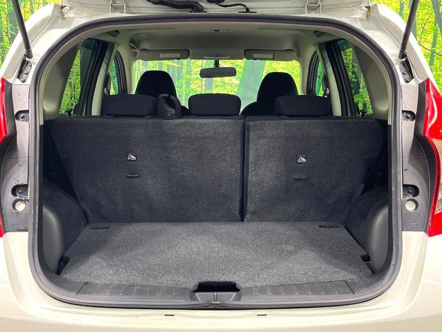 ノート ライダー ドライブレコーダー オーディオ スマートキー 革巻きステアリング アイドリングストップ 電動格納ミラー 純正15インチアルミ ヘッドライトレベライザー バニティミラー プライバシーガラス(10枚目)