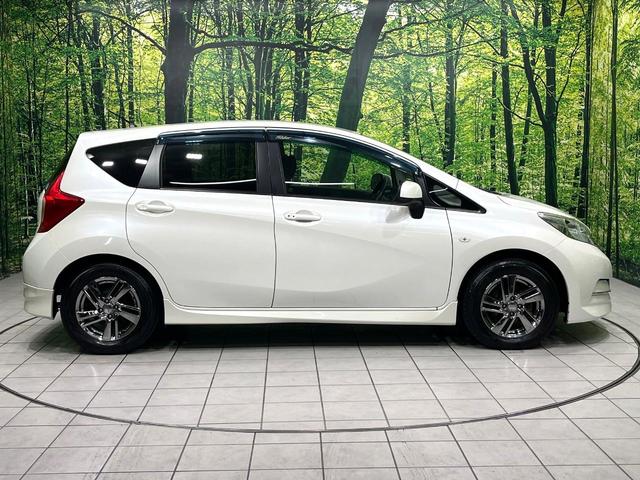 ノート ライダー ドライブレコーダー オーディオ スマートキー 革巻きステアリング アイドリングストップ 電動格納ミラー 純正15インチアルミ ヘッドライトレベライザー バニティミラー プライバシーガラス(46枚目)