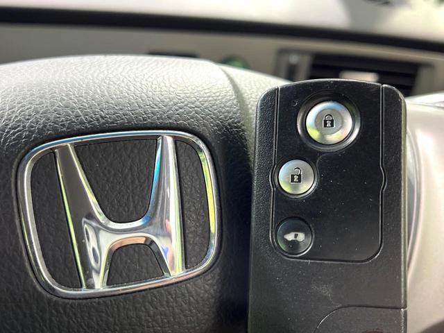 フリードハイブリッド ハイブリッド SDナビ バックカメラ 電動スライドドア スマートキー HIDヘッドランプ フルセグTV Bluetooth再生 オートライト ドライブレコーダー ETC 電動格納ミラー オートエアコン(31枚目)