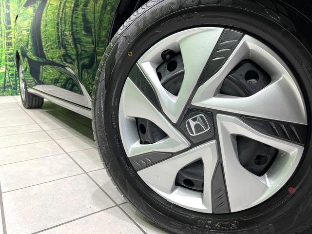 フリードハイブリッド ハイブリッド・Ｇホンダセンシング　純正ナビ　両側電動スライドドア　衝突軽減装置　ドラレコ　スマートキー　ＬＥＤヘッド　ＥＴＣ　オートハイビーム　車線逸脱警報　オートライト　オートエアコン　Ｂｌｕｅｔｏｏｔｈ　ＣＤ／ＤＶＤ再生　禁煙（14枚目）