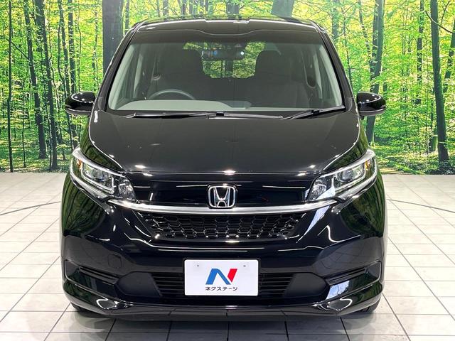 フリードハイブリッド ハイブリッド・Ｇホンダセンシング　純正ナビ　両側電動スライドドア　衝突軽減装置　ドラレコ　スマートキー　ＬＥＤヘッド　ＥＴＣ　オートハイビーム　車線逸脱警報　オートライト　オートエアコン　Ｂｌｕｅｔｏｏｔｈ　ＣＤ／ＤＶＤ再生　禁煙（25枚目）