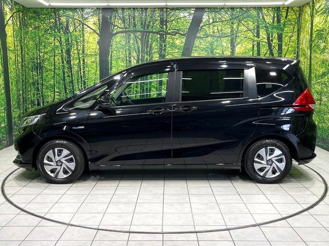 フリードハイブリッド ハイブリッド・Ｇホンダセンシング　純正ナビ　両側電動スライドドア　衝突軽減装置　ドラレコ　スマートキー　ＬＥＤヘッド　ＥＴＣ　オートハイビーム　車線逸脱警報　オートライト　オートエアコン　Ｂｌｕｅｔｏｏｔｈ　ＣＤ／ＤＶＤ再生　禁煙（29枚目）